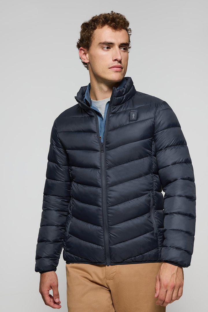 Navy-blue ultralight jacket Chase with Rigby Go patch