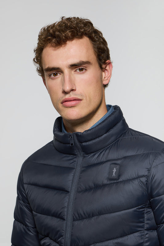 Navy-blue ultralight jacket Chase with Rigby Go patch