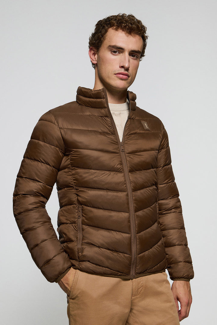 Brown ultralight jacket Chase with Rigby Go patch