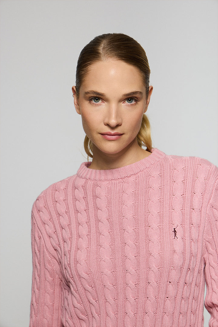 Pink cable-knit jumper with Rigby Go embroidered logo