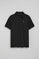 Black polo shirt with three buttons and Rigby Go embroidered logo