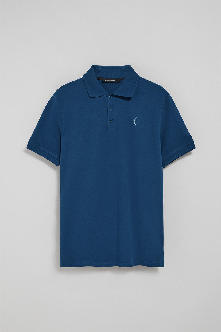 Indigo-blue polo shirt with three buttons and Rigby Go embroidered logo