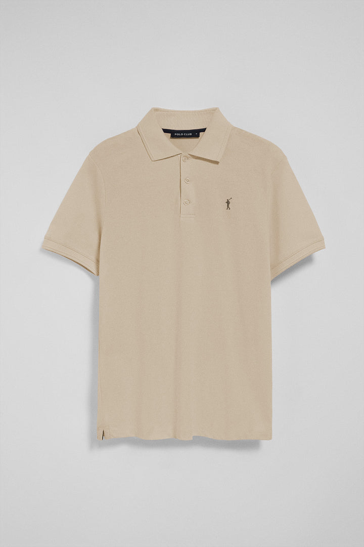 Beige polo shirt with three buttons and Rigby Go embroidered logo