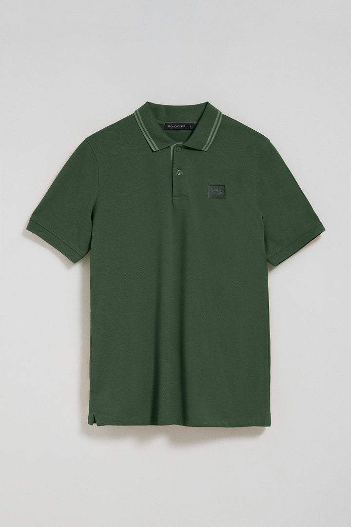 Green polo shirt with two buttons and Polo Club logo