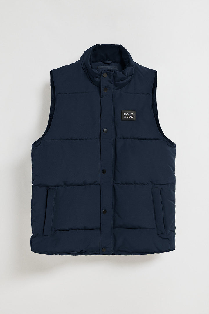 Blue puffer vest with Polo Club rubber patch