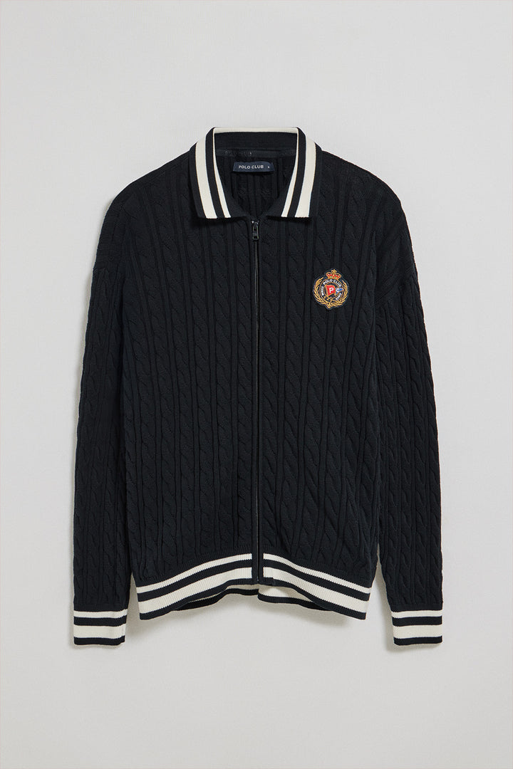 Navy-blue cable-knit cardigan with zip and nautical logo