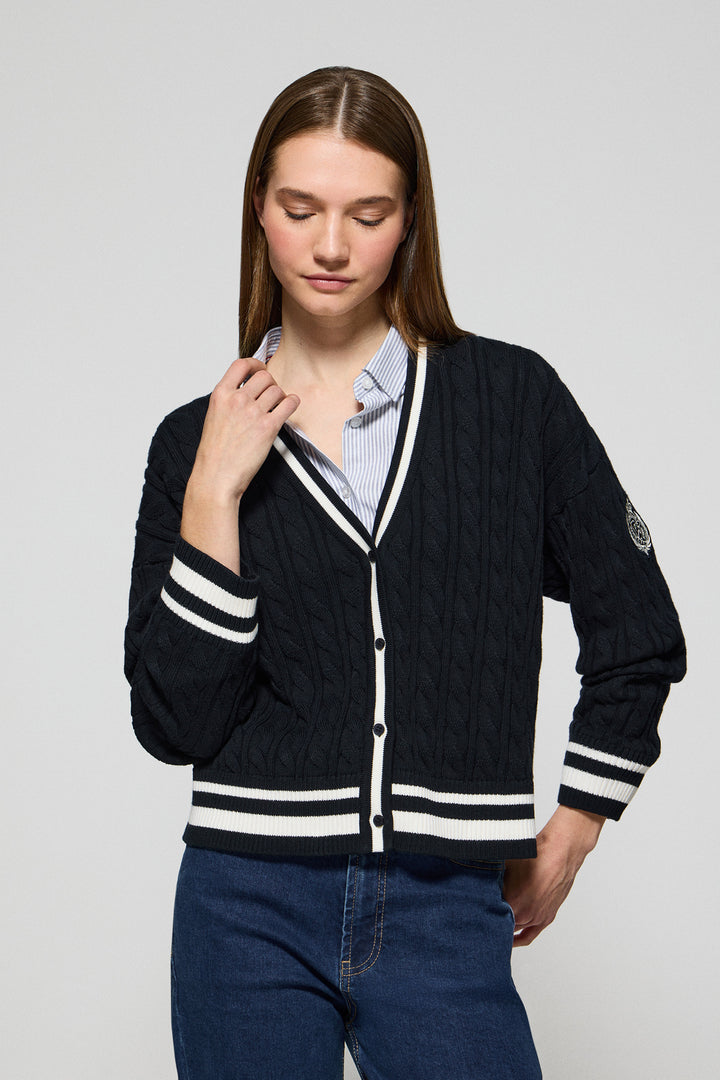 Navy-blue cable-knit short cardigan with buttons and nautical patch