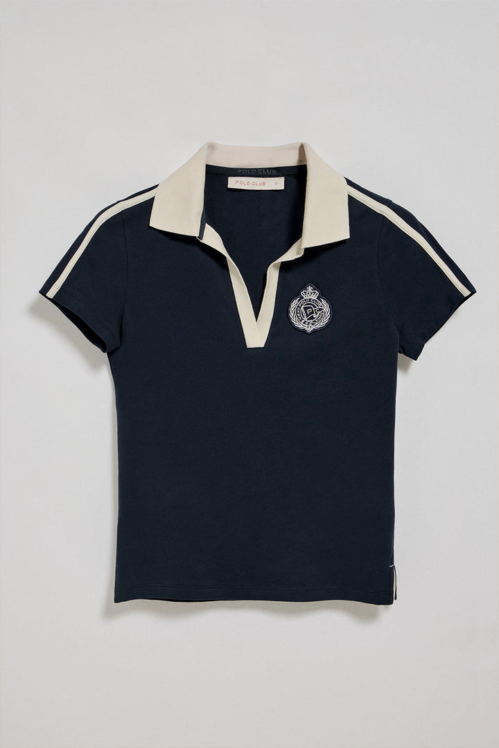 Navy-blue buttonless polo shirt with nautical badge