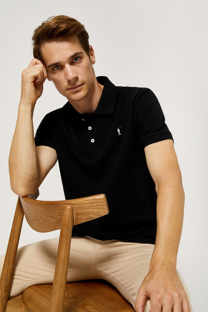 Black pique polo shirt with three-button placket and contrast embroidered logo